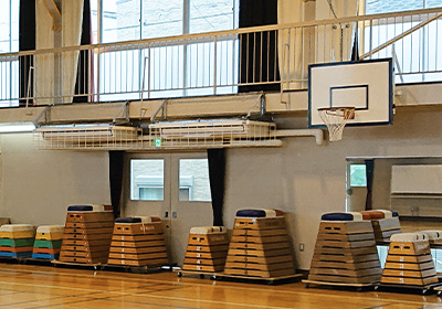 Ball-proof guard Edison hardware attached to the gymnasium